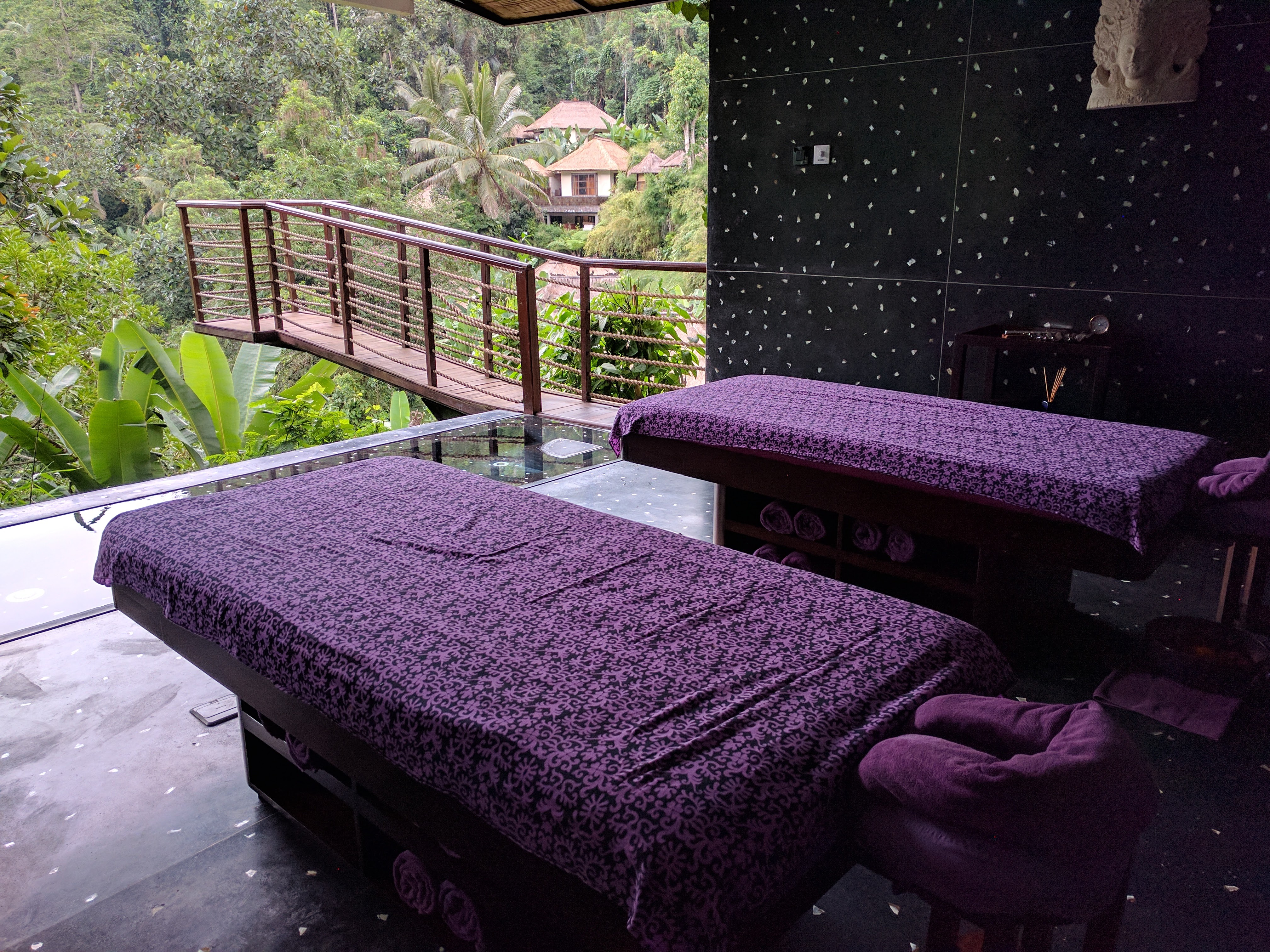 Purple massage table at the Hanging Gardens resort in Bali overlooking the jungle
